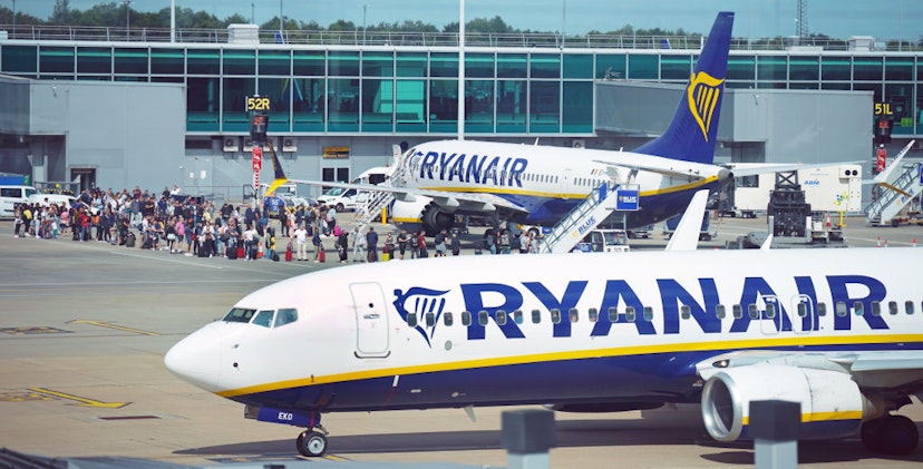 RETRANSMITTING AMENDING DATE Previously unissued photo dated 04/07/22 of passengers queuing to board Ryanair planes at Stansted Airport, Essex. Issue date: Tuesday July 26, 2022. (Photo by Niall Carson/PA Images via Getty Images)